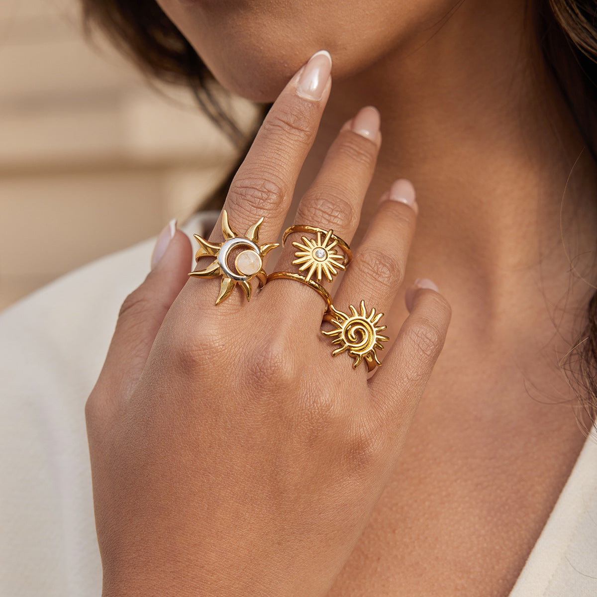Three celestial adjustable open rings worn on hand in gold and two tone styles