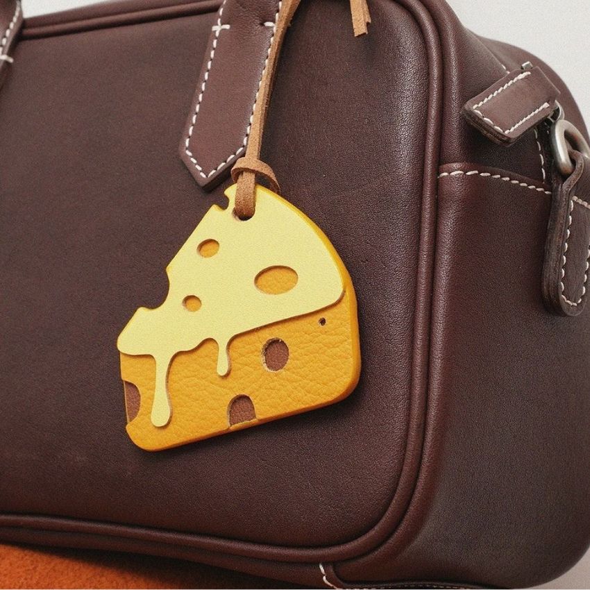 cheese keychain on brown handbag – cute bag charm and food key chain accessory for gift or wholesale