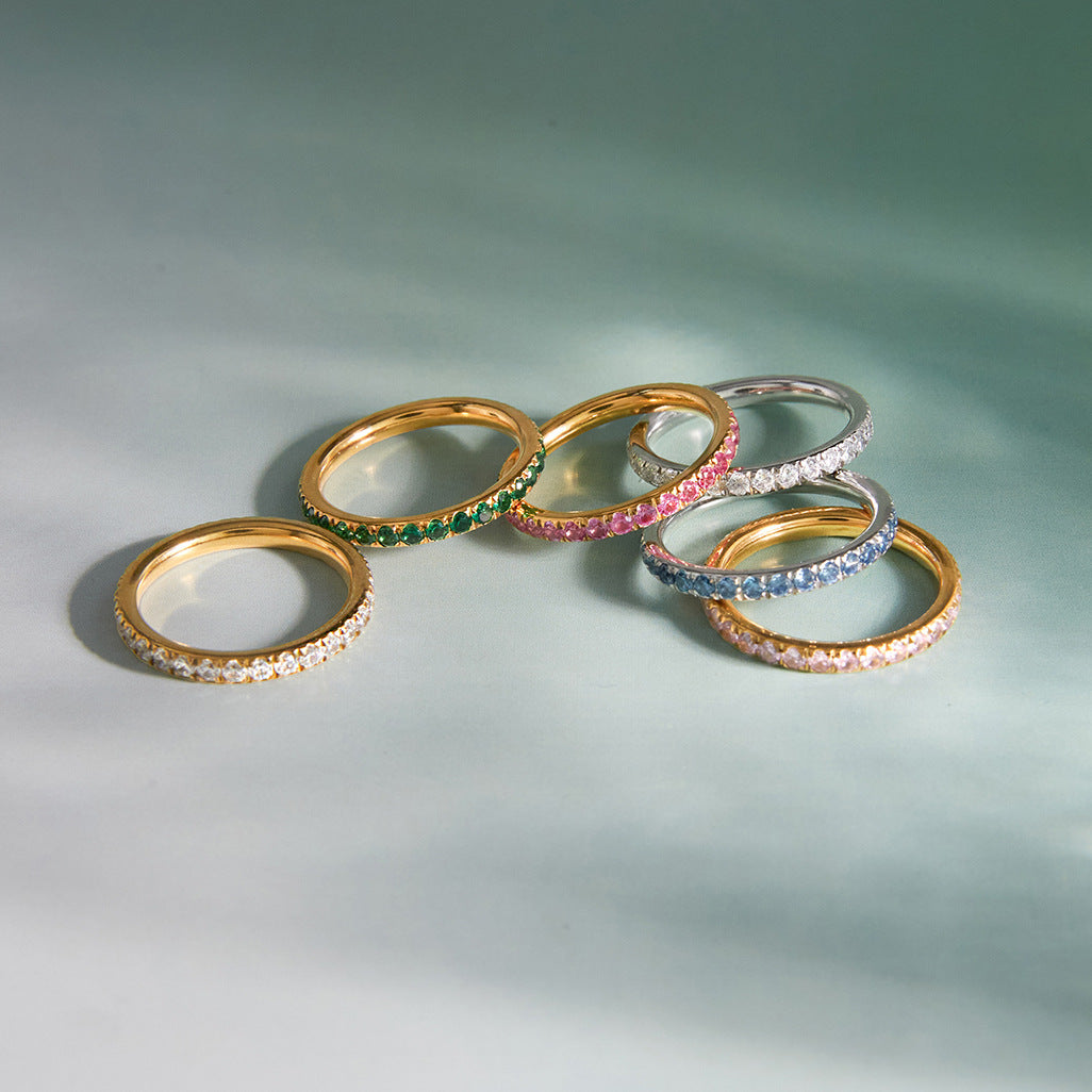 Clear green pink and blue cubic zirconia eternity rings for wholesale resale