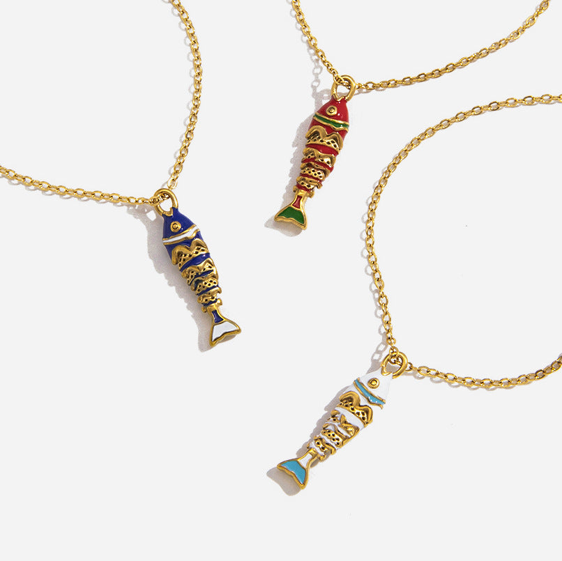 Blue red and white enamel fish pendant necklaces in gold tone stainless steel
