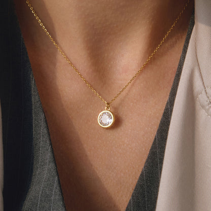 Gold tone stainless steel necklace with round cubic zirconia pendant for wholesale jewelry set buyers