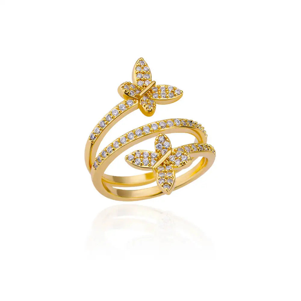 Gold tone butterfly open ring with cubic zirconia accents for boutique resale and gift collections
