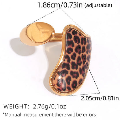 Adjustable curved leopard statement ring made from polished stainless steel