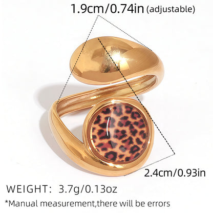Round leopard print open ring with sculptural gold tone stainless steel design