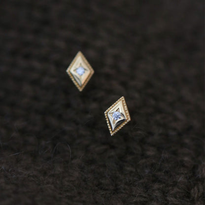 18K gold diamond shaped stud earrings close-up