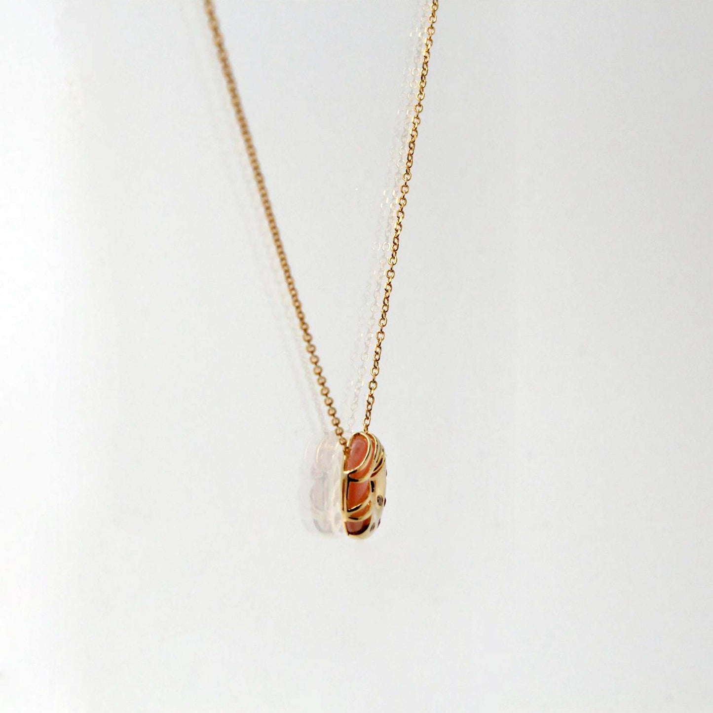 side view donut shaped pendant necklace with enamel dessert design