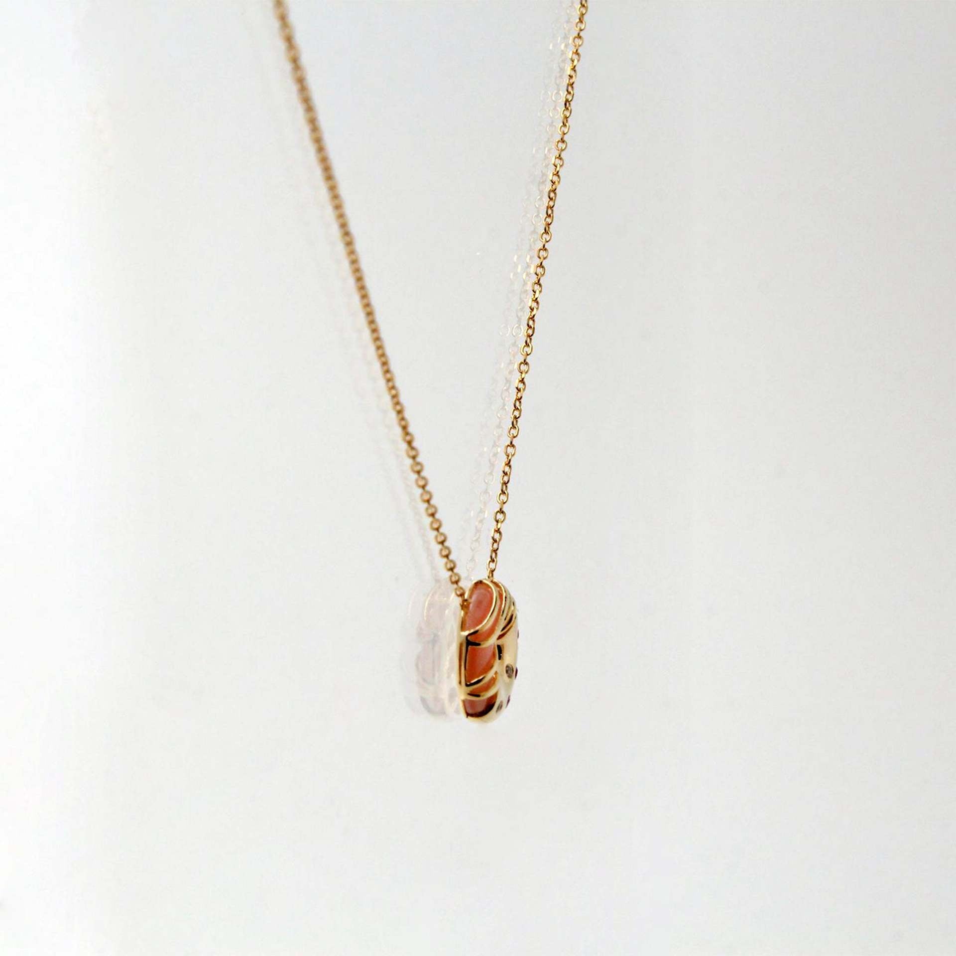 side view donut shaped pendant necklace with enamel dessert design