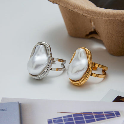 Adjustable stainless steel statement ring with faux baroque pearl or brown accent