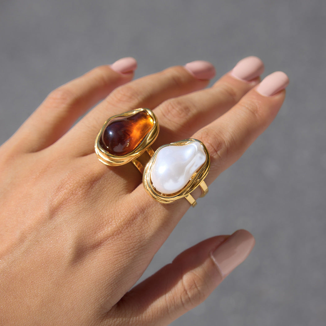 Adjustable stainless steel statement ring with faux baroque pearl or brown accent