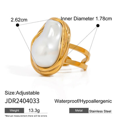 Adjustable stainless steel statement ring with faux baroque pearl or brown accent