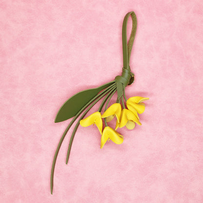 Yellow floral PU leather bag charm keychain with loop strap for wholesale