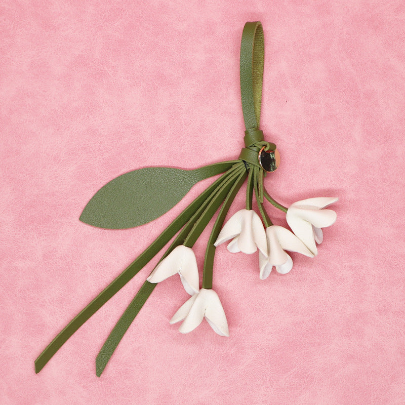 White flower bag charm keychain wholesale PU leather with green leaf strap
