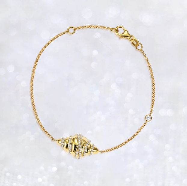 Croissant bracelet product photo gold tone chain with crystal accents
