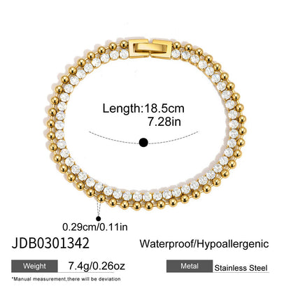 Gold stainless steel double row tennis bracelet with cubic zirconia stones and size details
