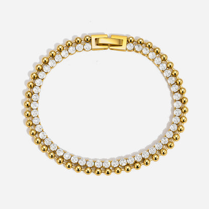 Gold double row bracelet with clear cubic zirconia tennis row and polished beaded row