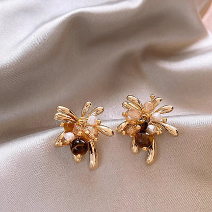 gold cluster earrings floral pearl design Tiger Eye accents Black May
