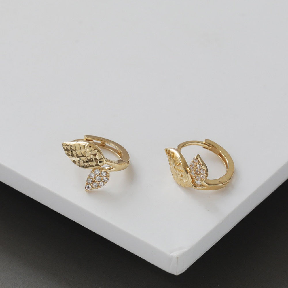 S925 sterling silver leaf huggie earrings featuring textured gold leaf design and cubic zirconia pavé details