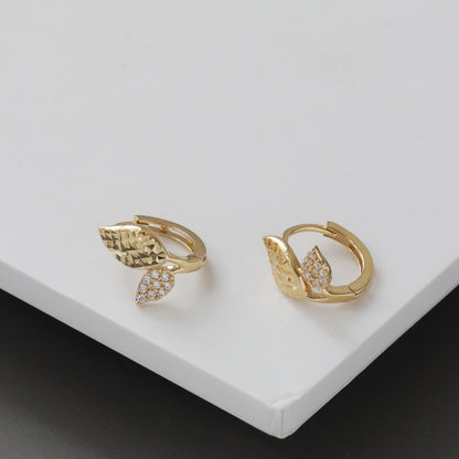 S925 sterling silver leaf huggie earrings featuring textured gold leaf design and cubic zirconia pavé details