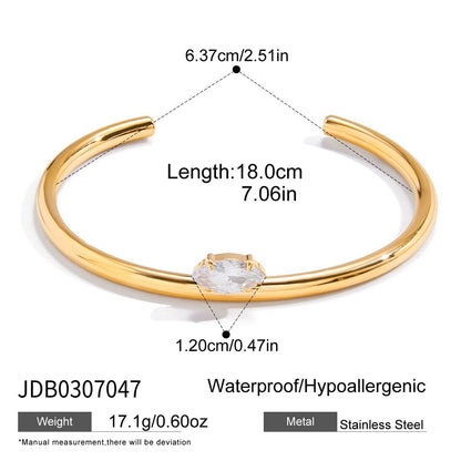 Gold stainless steel open cuff bracelet with marquise white zircon size details