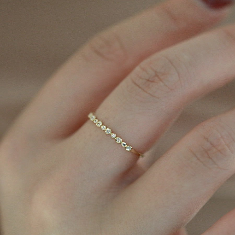 S925 sterling silver 14K gold plated zircon stacking ring worn on finger with minimalist design