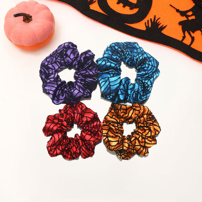 hair scrunchies in purple blue red and orange