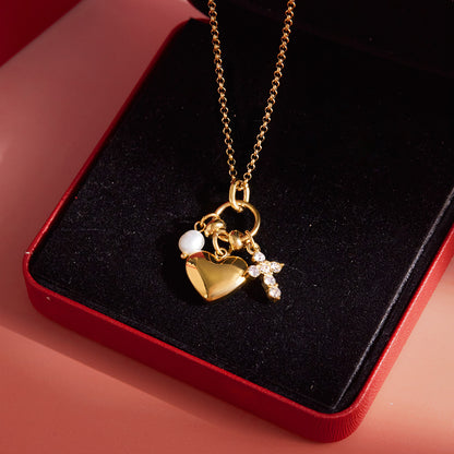 Stainless steel heart and freshwater pearl charm necklace in gift box