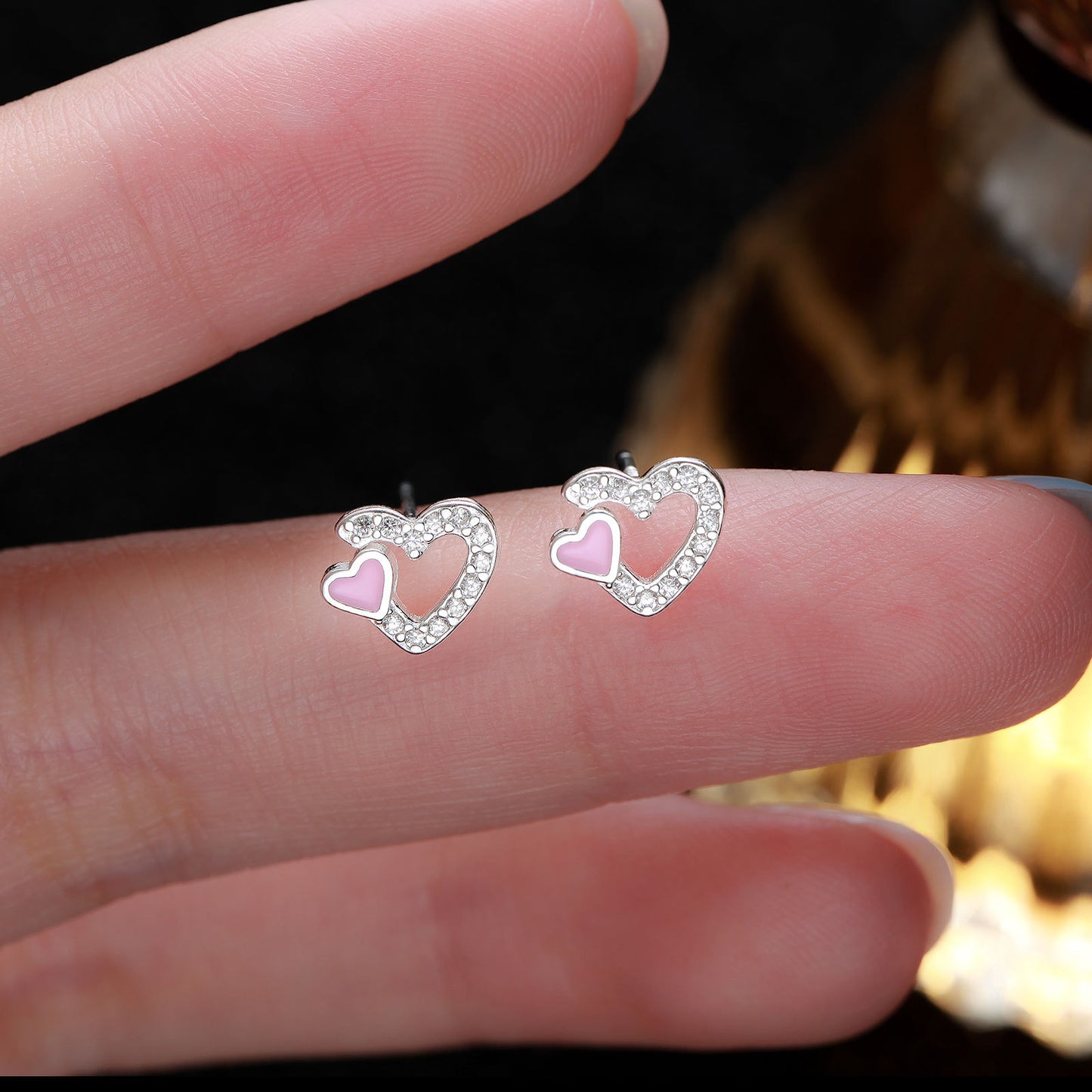 Close up of S999 pure silver double heart earrings with pink enamel and crystals JR Fashion Accessories