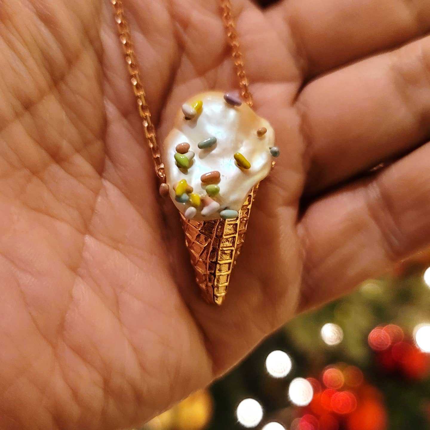 ice cream cone pendant necklace with white scoop and colorful sprinkle bead details