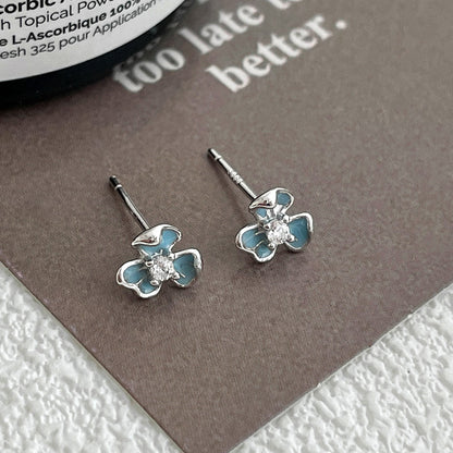 iris earring on model dainty silver flower stud