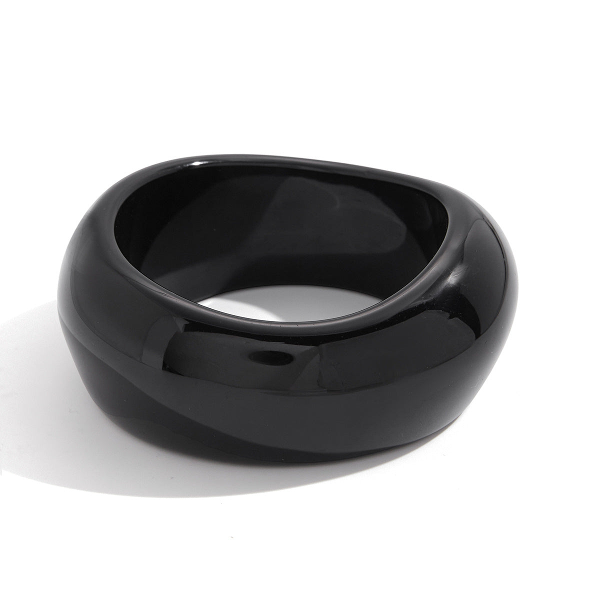 Black wide resin bangle with glossy finish