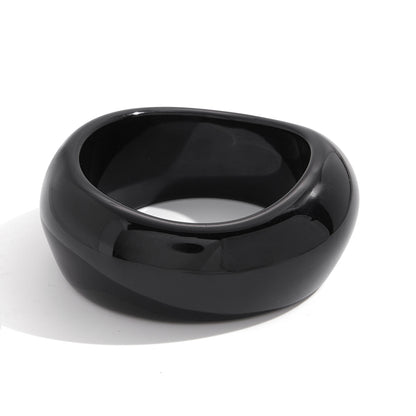 Black wide resin bangle with glossy finish