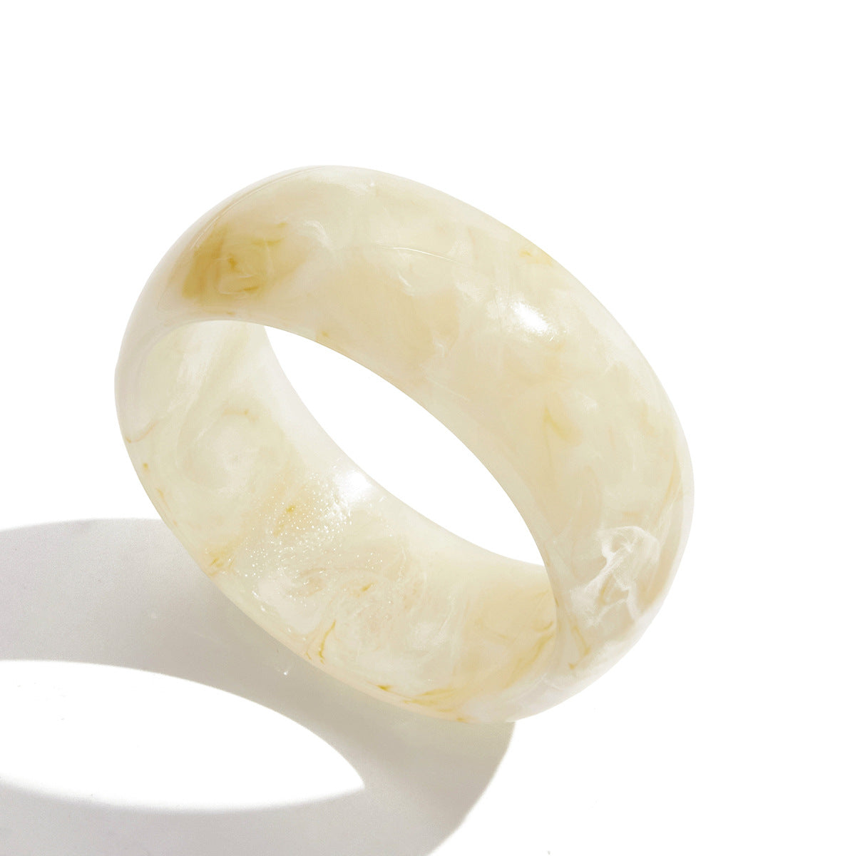  Cream color irregular wide resin bangle with marbled texture