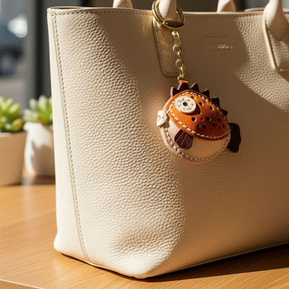 kawaii pufferfish keychain used as leather bag charm on tote bag – stylish cute keychain for handbags and wholesale gift shops