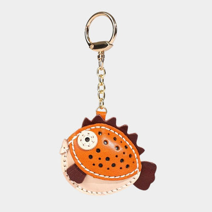 kawaii pufferfish leather keychain with hand sewn details and gold clasp – cute animal bag charm for wholesale accessories