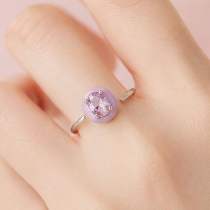 Adjustable silver tone ring with oval lavender zircon and enamel detail