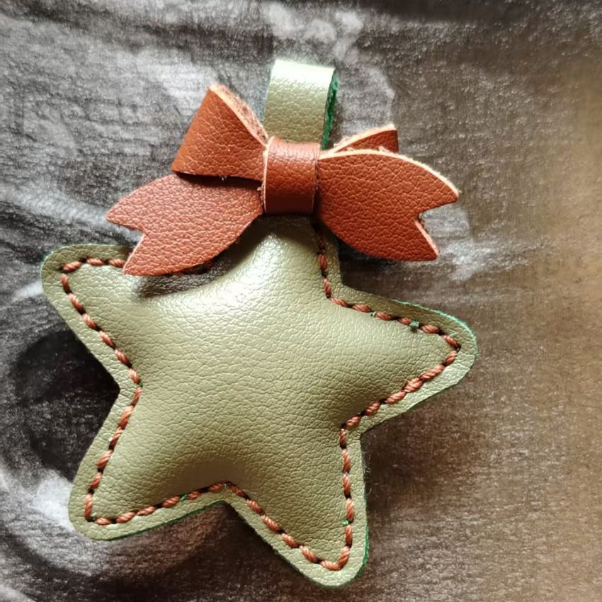 Olive green leather star with brown bow, earthy tone leather embellishment