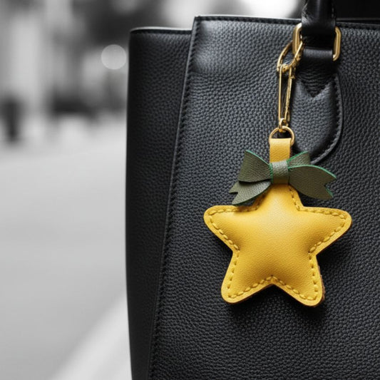 Yellow leather star embellishment with green bow, perfect for holiday bag decoration