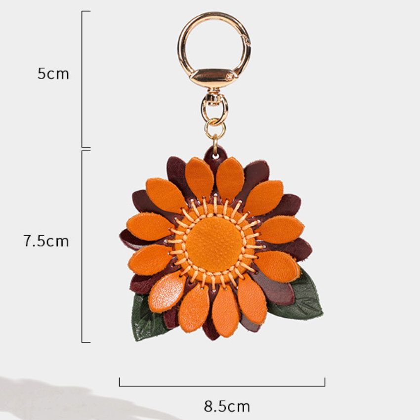 Sunflower keychain made of real leather, dual-tone orange and brown petals, ideal for handmade bulk keychain collections