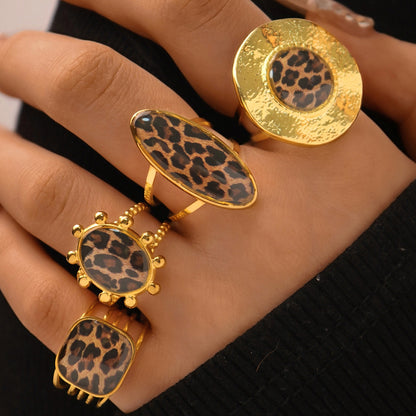 Four 18K gold plated stainless steel leopard rings in selectable statement designs