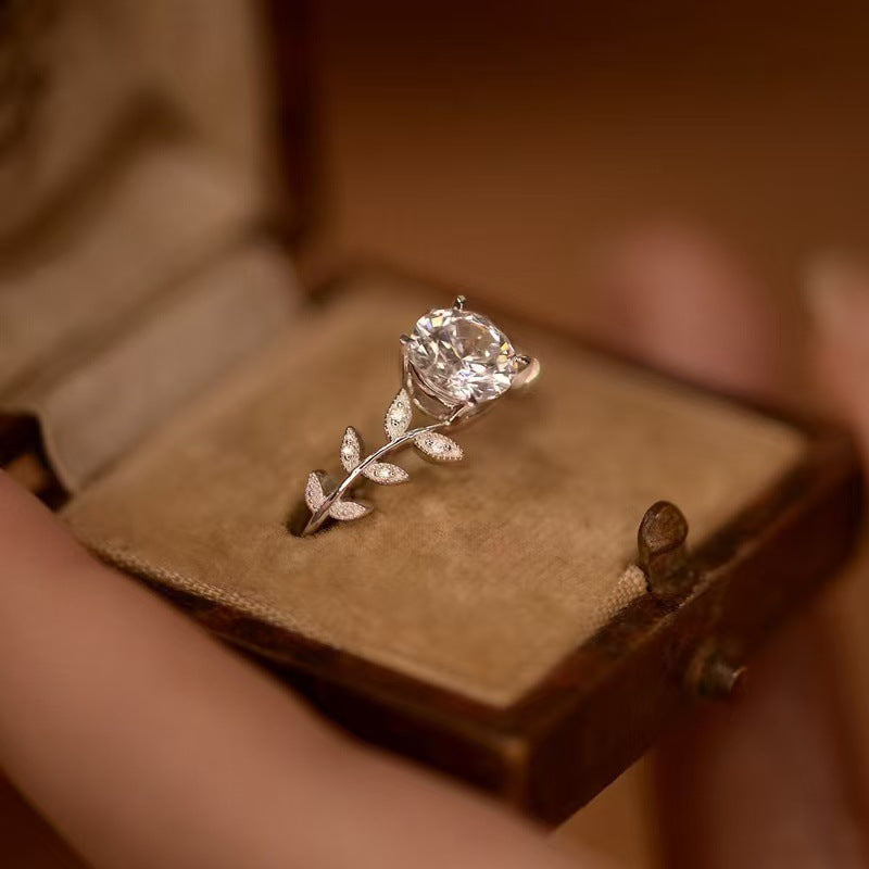 Elegant Modern Heirloom Goddess Ring with round zircon stone and nature inspired leaf details