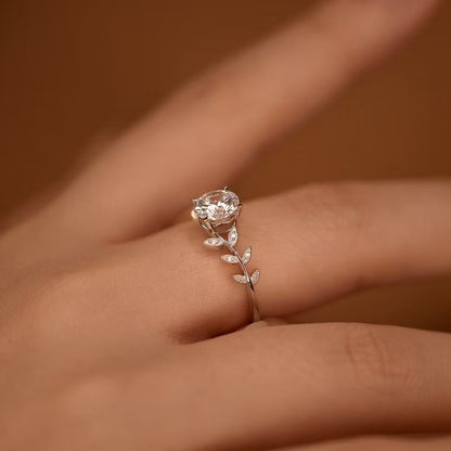 Close up of S925 sterling silver laurel leaf ring with sparkling 6MM zircon centerpiece