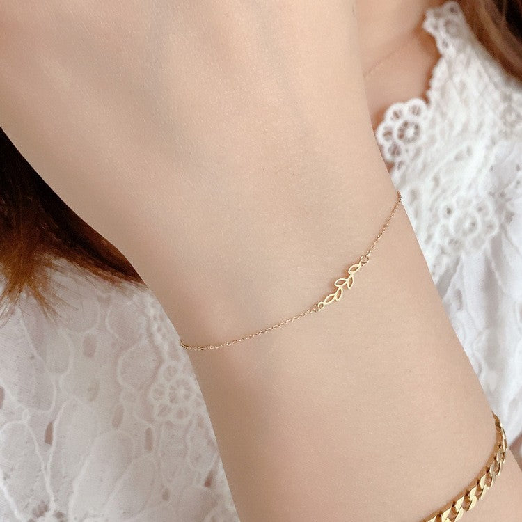 minimalist gold bracelet for women olive leaf design