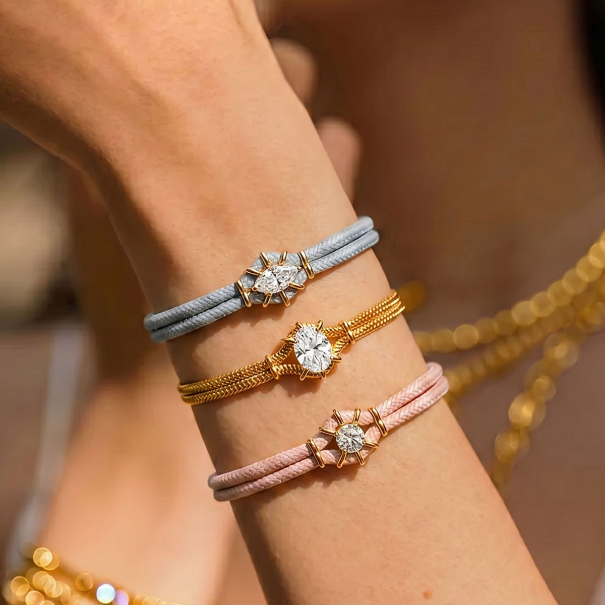 Pastel braided bracelets; gold metal bracelet not included