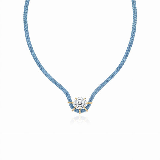 Blue round cubic zirconia braided cord necklace