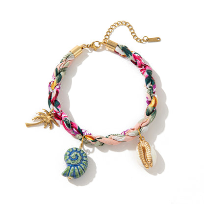 Pastel braided ocean bracelet with whale palm and shell charms gold plated hardware
