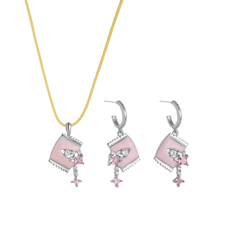 Matching pink enamel candy wrapper zircon necklace and drop earrings