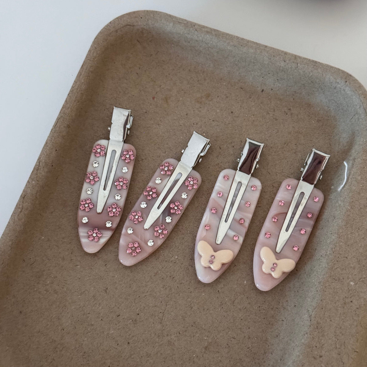 pcs Korean hair clips set with flower and butterfly popstar clips designs.