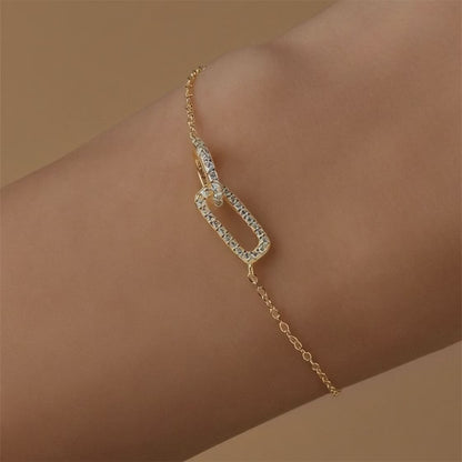 Video demonstration of the zircon shine on the JR Fashion Accessories crossed loop jewelry.