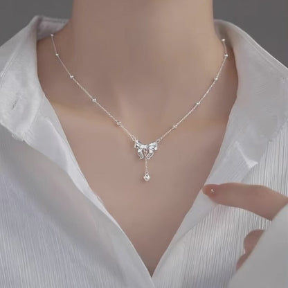 Model-wearing-S925-Silver-Bow-Necklace-JR-Fashion-Accessorie