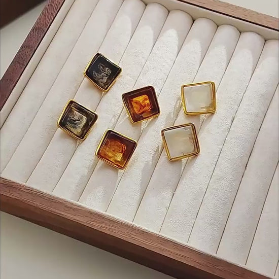 Video showing vintage square resin stud earrings in mixed colors for wholesale boutique jewelry sourcing